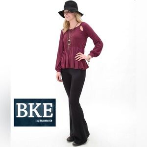 Buckle’s BKE High Stretch Dark Charcoal Flare Mid Rise Leggings Size Small